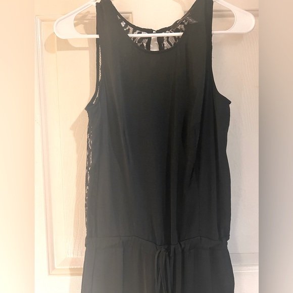 Sexy & Sophisticated BCBGMaxAzria Black Lace Detail Jumpsuit with Pockets - Picture 5 of 10
